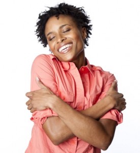 black-woman-hugging-herself-275x300